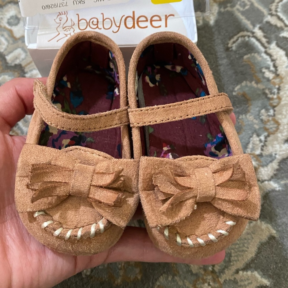 Baby Deer tan moccasins with fringe bow